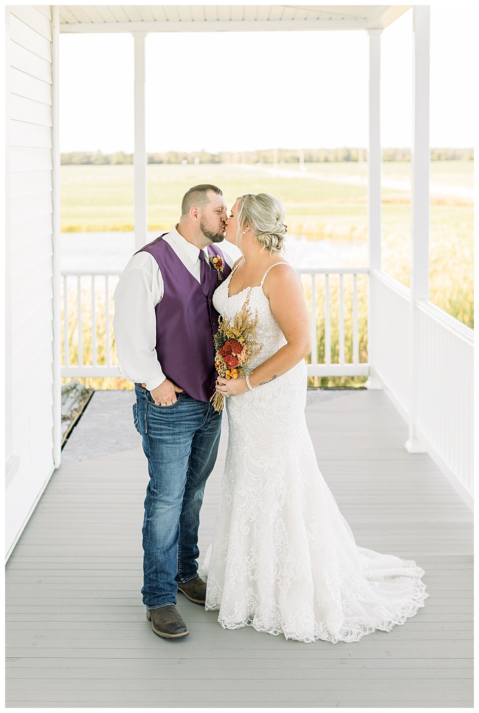 Bride and Groom share a kiss at beautiful fall wedding